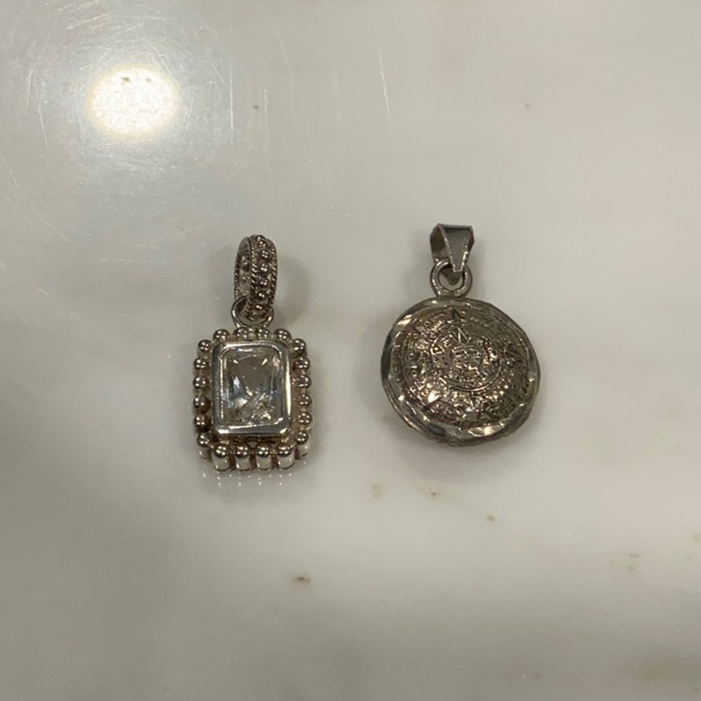 2 beautiful sterling silver pendants
